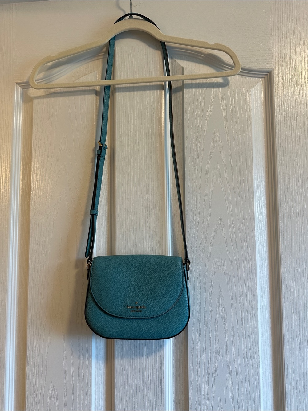 kate spade teal pebbled leather crossbody saddle bag